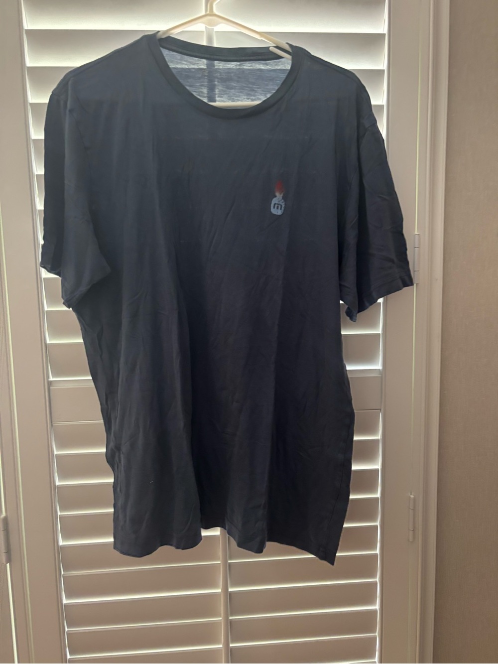 TravisMathew Black Short Sleeve Tee with Small pineapple Logo